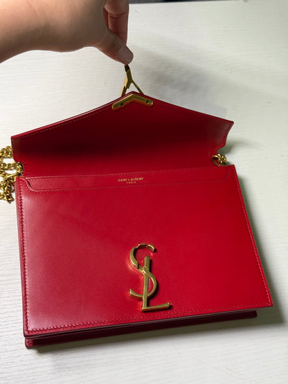 SAINT LAURENT
Grain De Poudre Monogram Cassandra
Clasp Shoulder Crossbody Bag