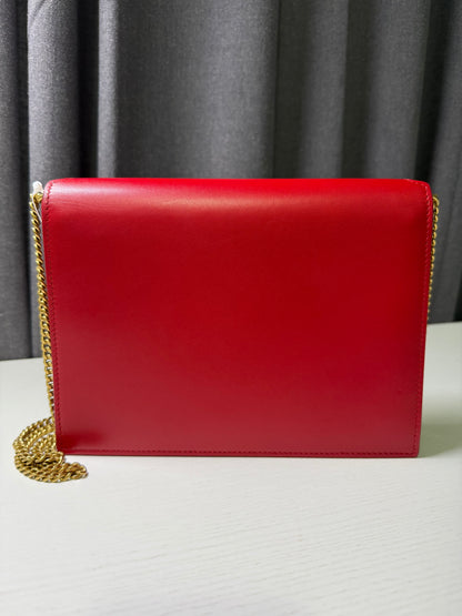 SAINT LAURENT
Grain De Poudre Monogram Cassandra
Clasp Shoulder Crossbody Bag