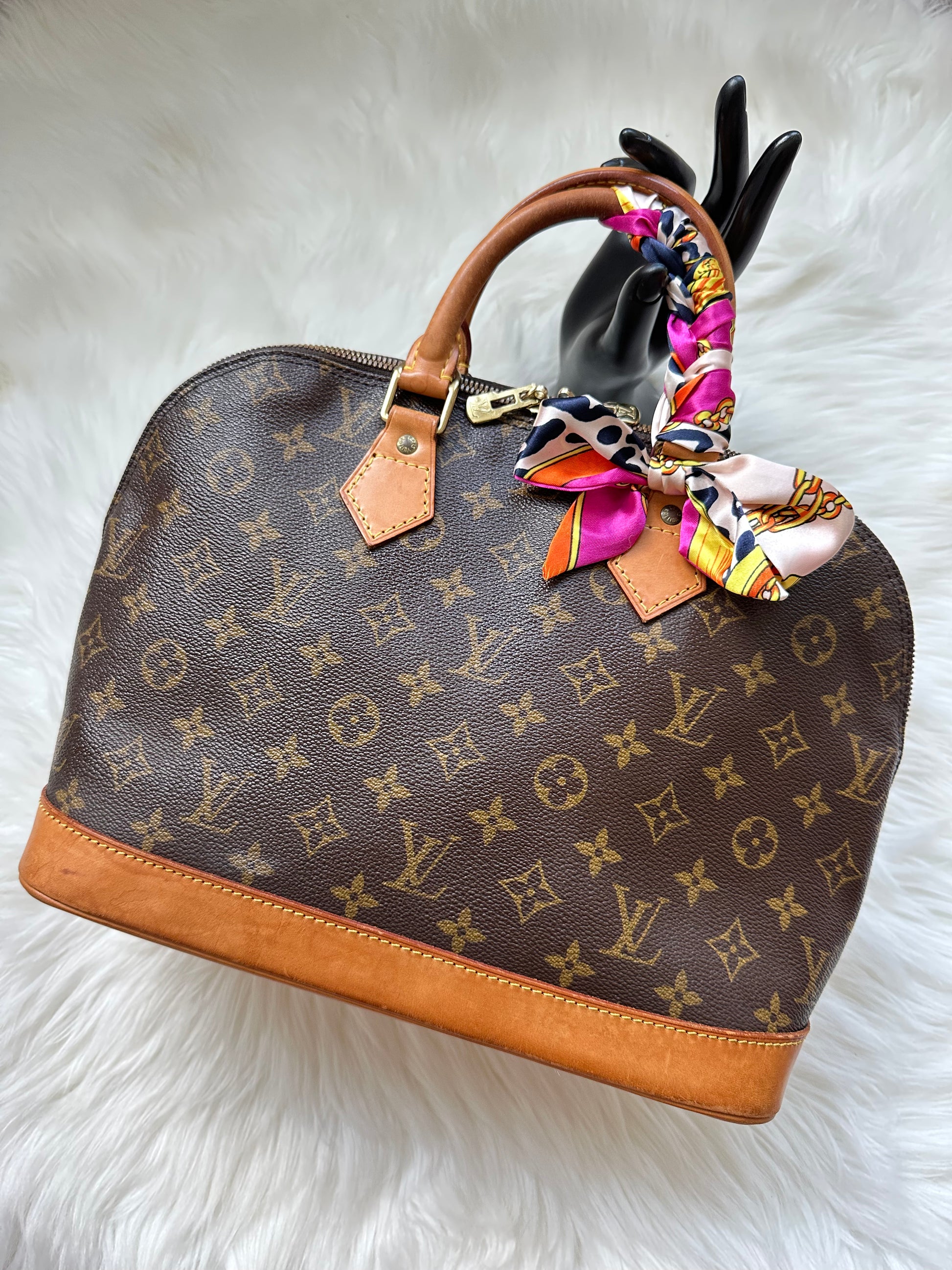 Pre-Owned Louis Vuitton Alma PM Brown Handbag 